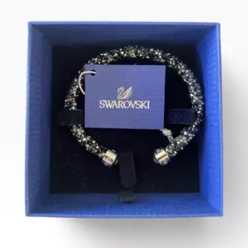 A contemporary Swarovski crystal cuff bracelet, in original box. H.5cm x W.8cm.