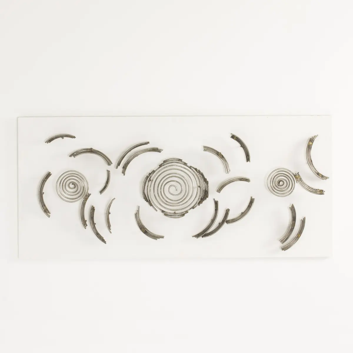 “Milky Way” steel wall sculpture by Fred Leyman