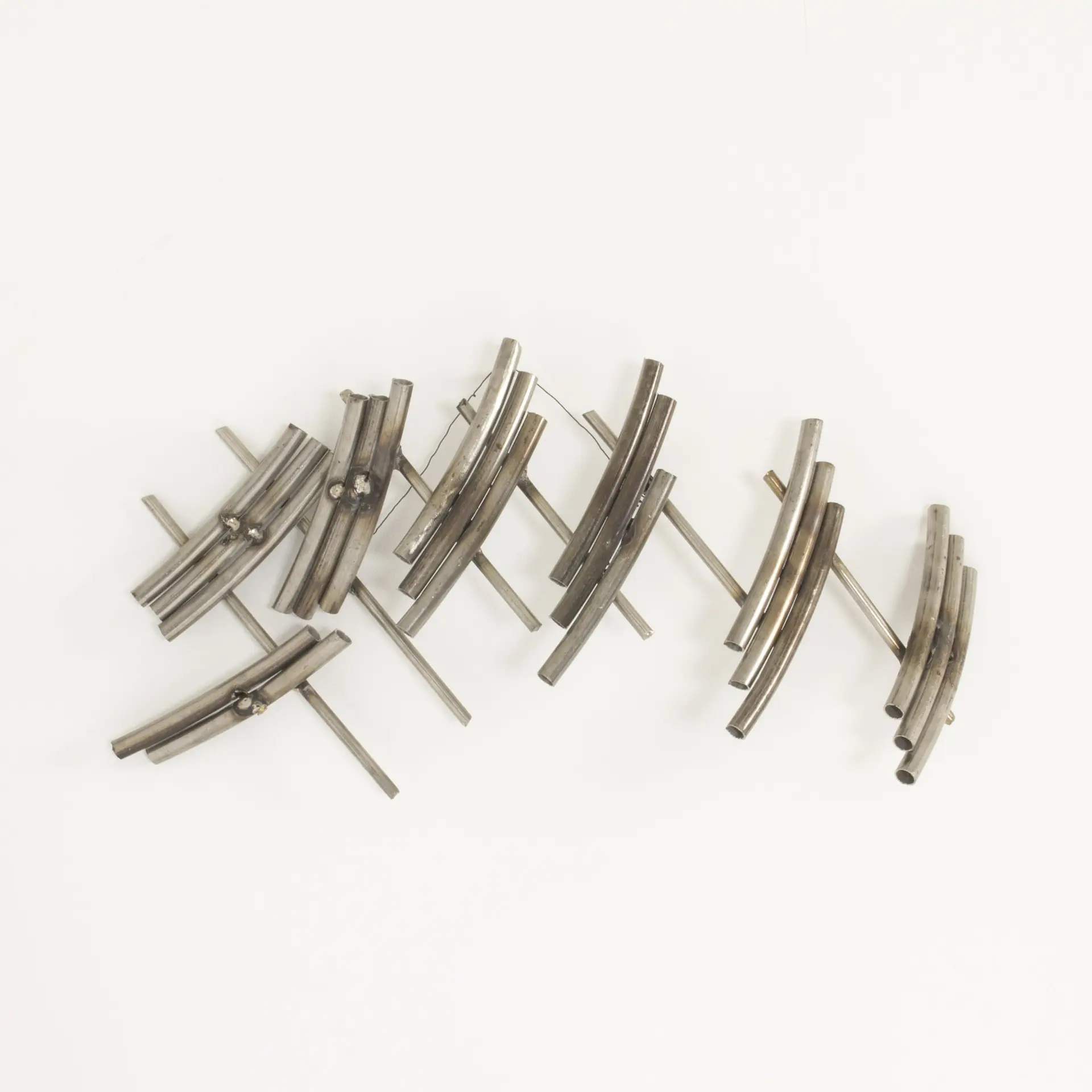 Steel wall sculpture by Fred Leyman