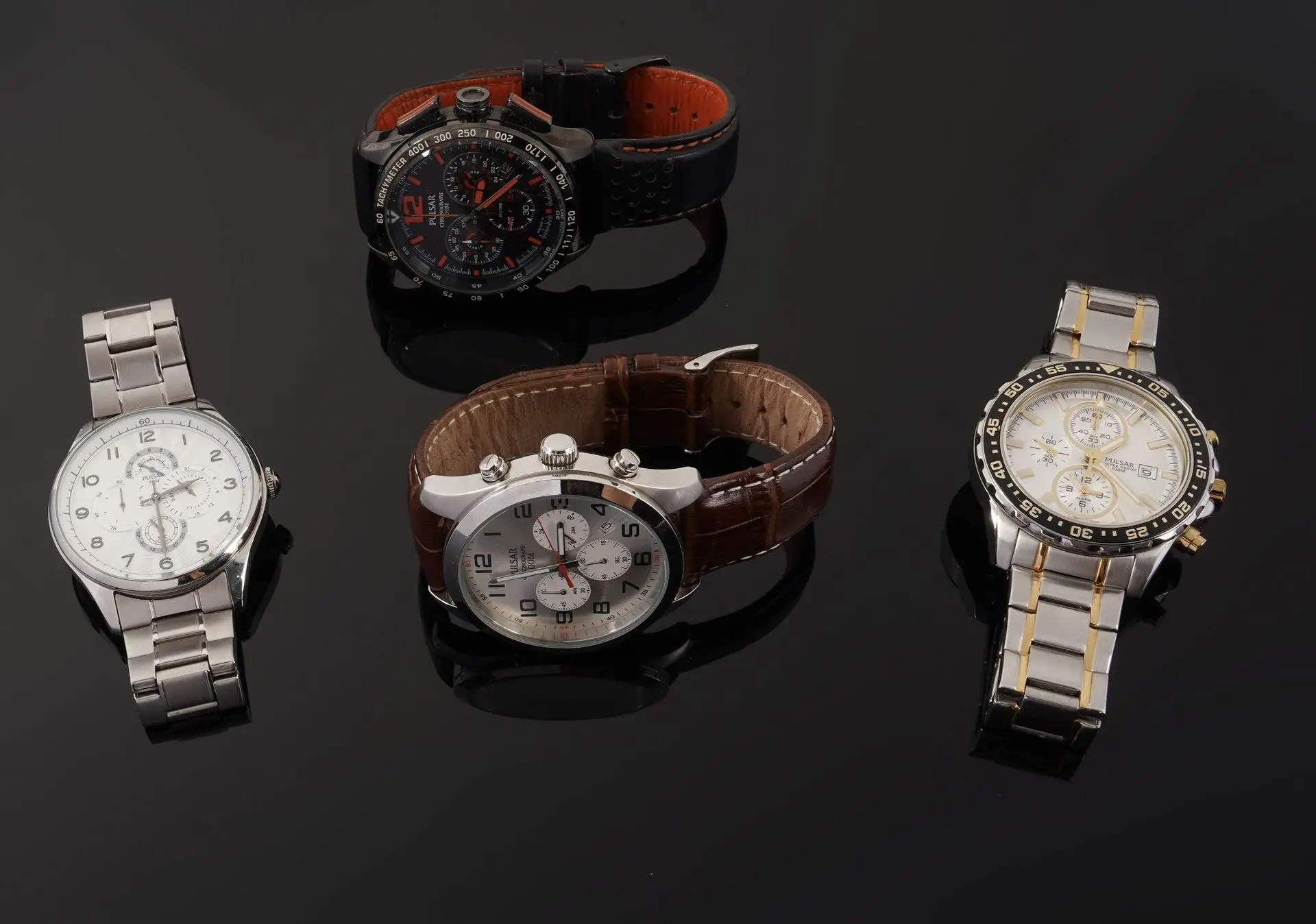 PULSAR — Set of 4 Men's Wristwatches - Lot 385