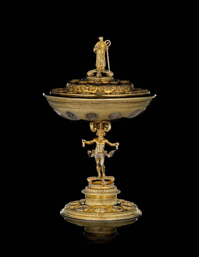 A German silver-gilt covered cup set with antique coins, Hans (Johann)