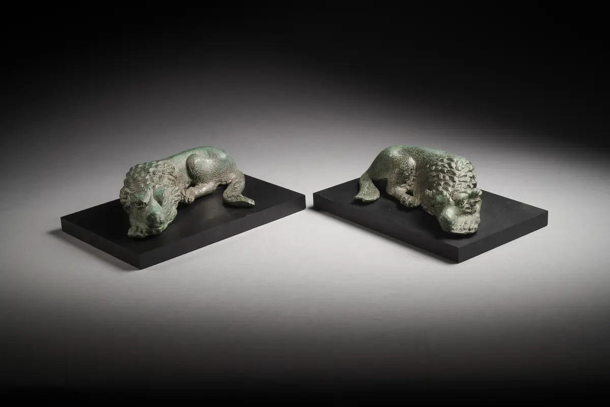 A pair of Roman bronze molossian hounds