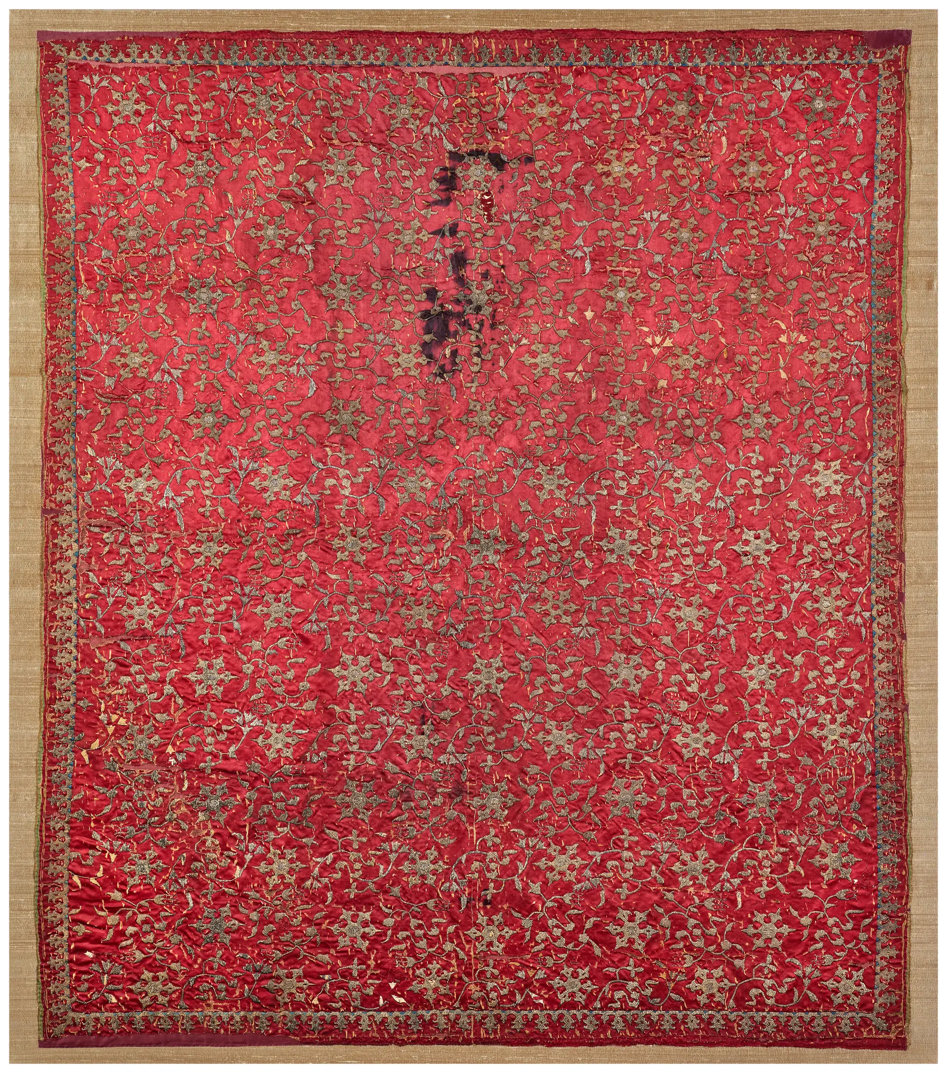 An Embroidered Silk Panel Decorated with Chinese Tchi Clouds