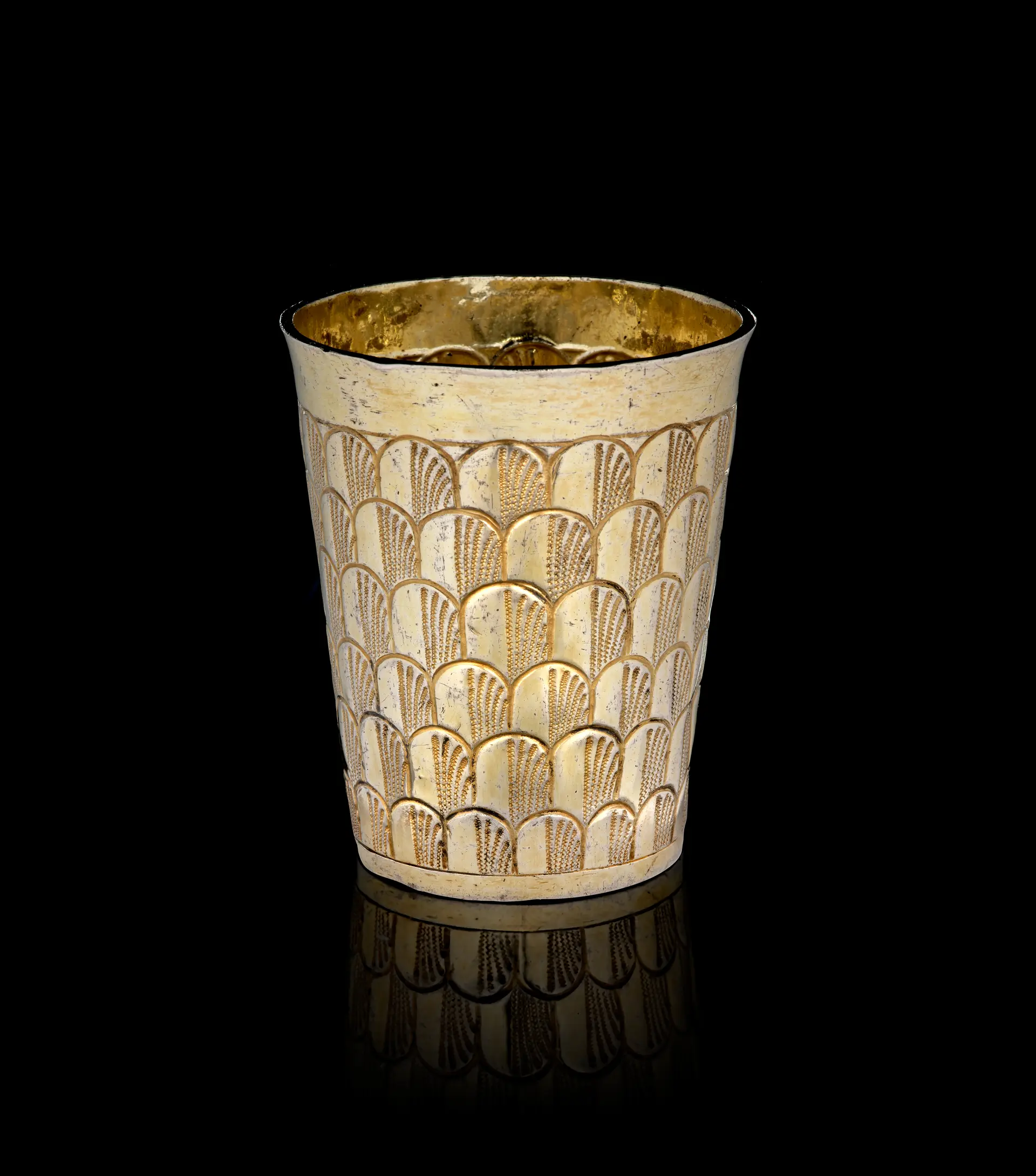 A Swiss silver-gilt beaker with peacock feathers motifs, Hans Heinrich
