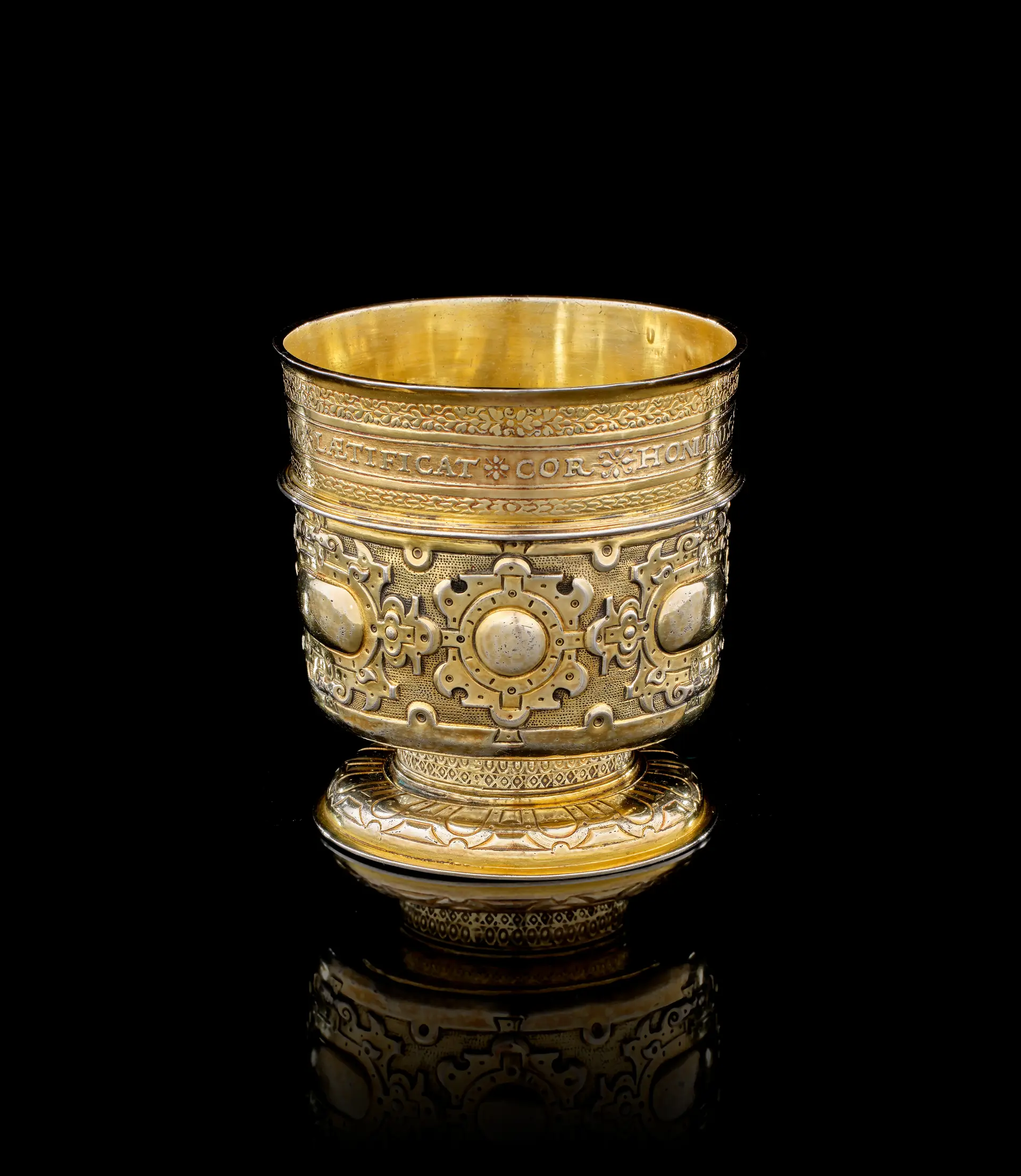 A German silver-gilt coin beaker, Arnold Schmidt, Nuremberg, 1571