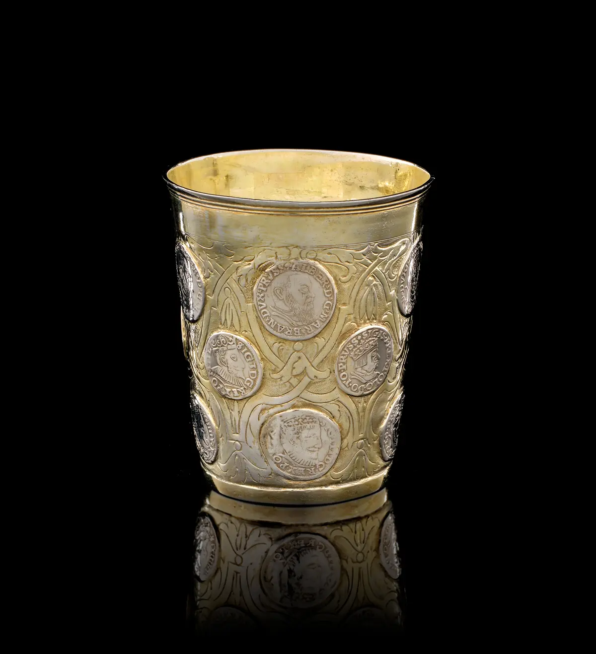 A German parcel-gilt silver beaker with coins, Johann Heinrich Graf