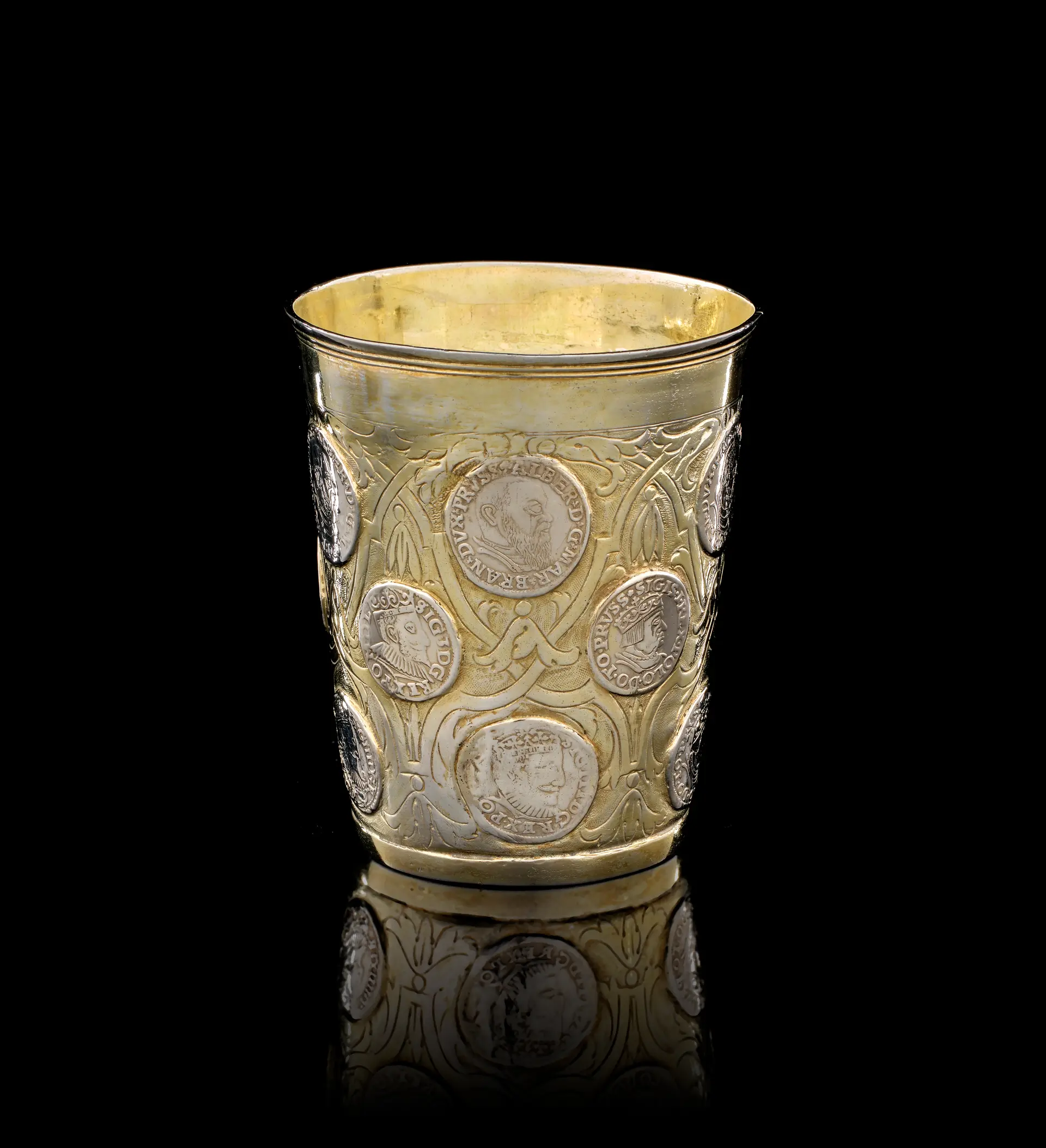 A German parcel-gilt silver beaker with coins, Johann Heinrich Graf