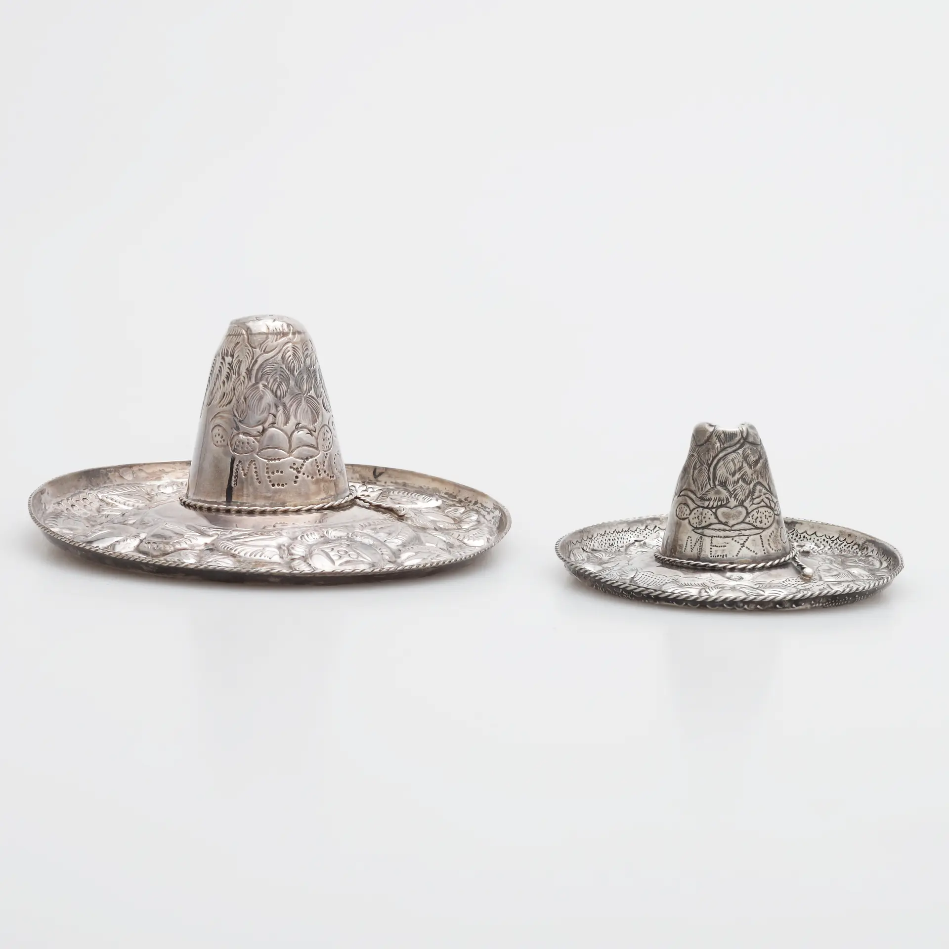 SKULPTURER, 2 st, sterlingsilver, sombreros, totalvikt 94 gram.