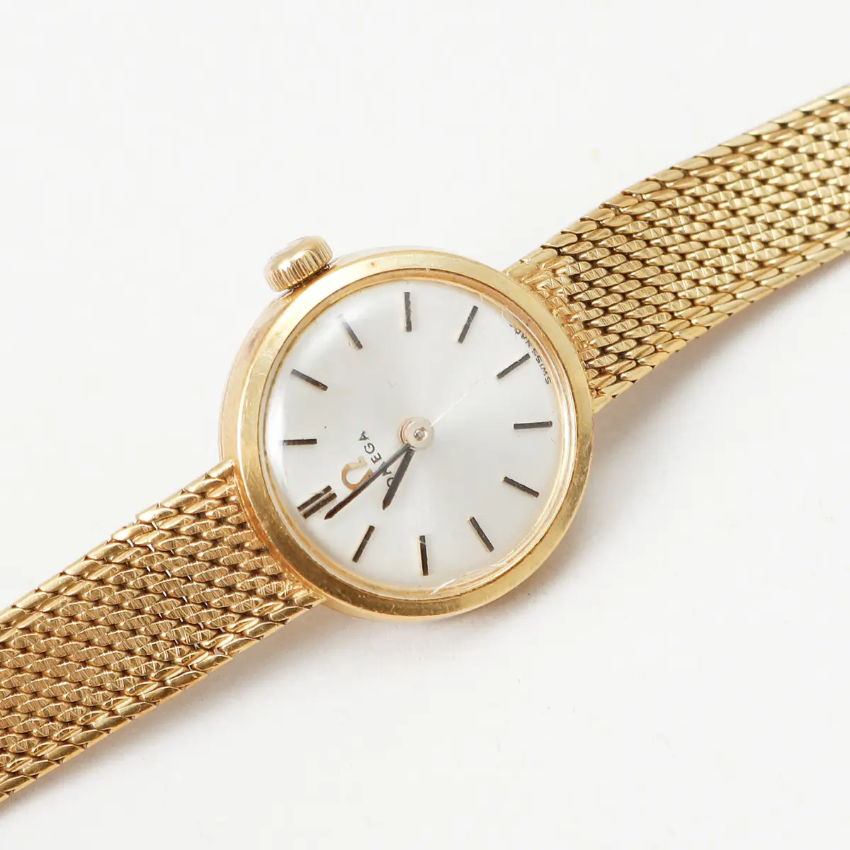 ARMBANDSUR, Omega, 18k guld med integrerad länk. Totalvikt ca 29,5 g.