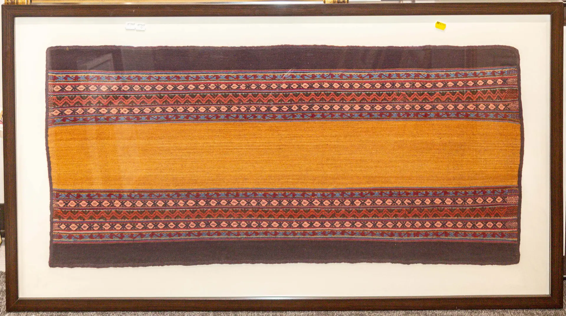 A Peruvian Hand-Woven Textile Panel, Framed