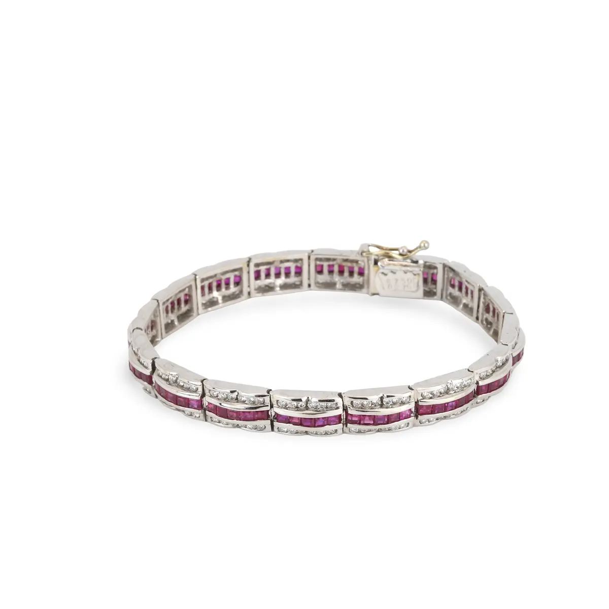 18CT GOLD RUBY & DIAMOND BRACELET.