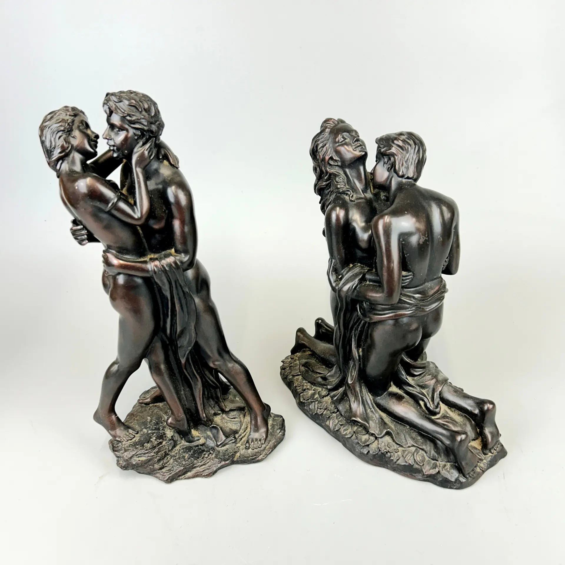 BRONZED RESIN FIGURES.