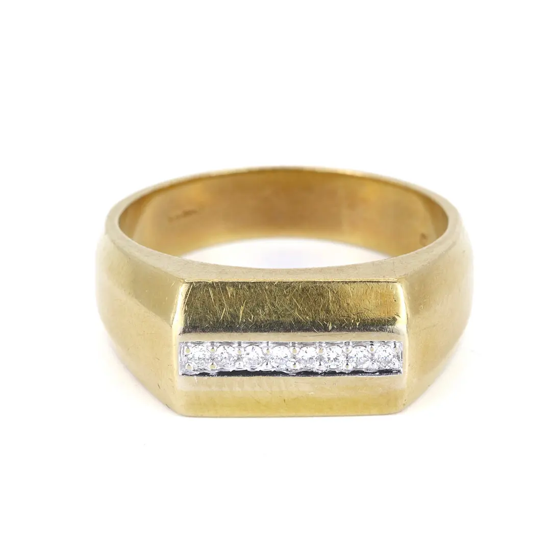 18CT GOLD DIAMOND RING.