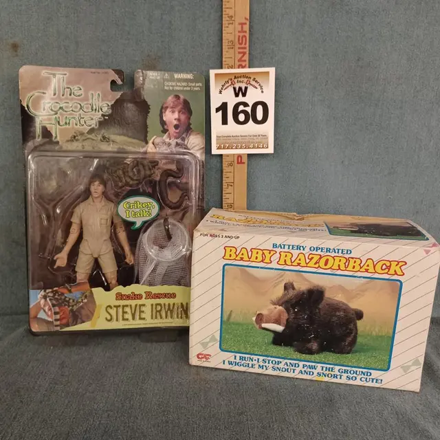 Baby Razorback toy and Steve Irwin action figure