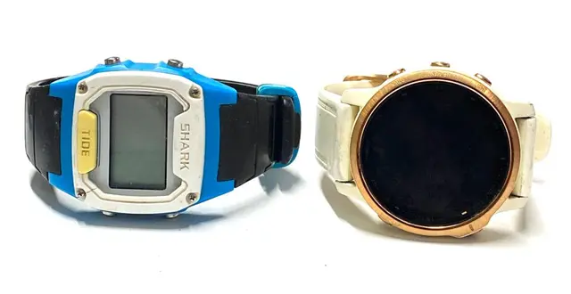 A Smart Watched marked Fenix & a Digital Watch marked Shark
