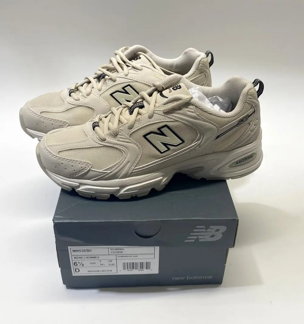 A pair of shoes marked New Balance size EU39.5