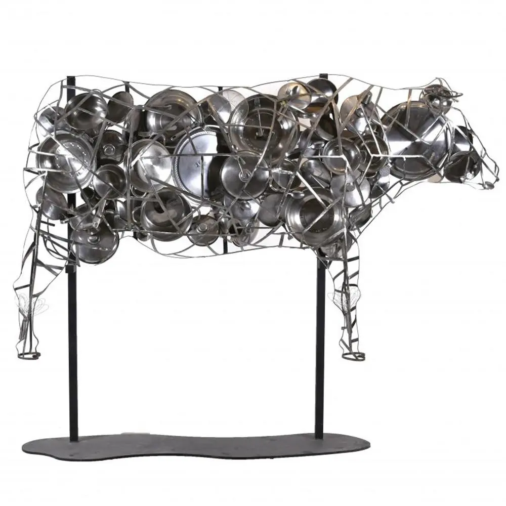 "COW", A SCULPTURE THAT DECORATED ONE OF THE ROOMS OF THE...