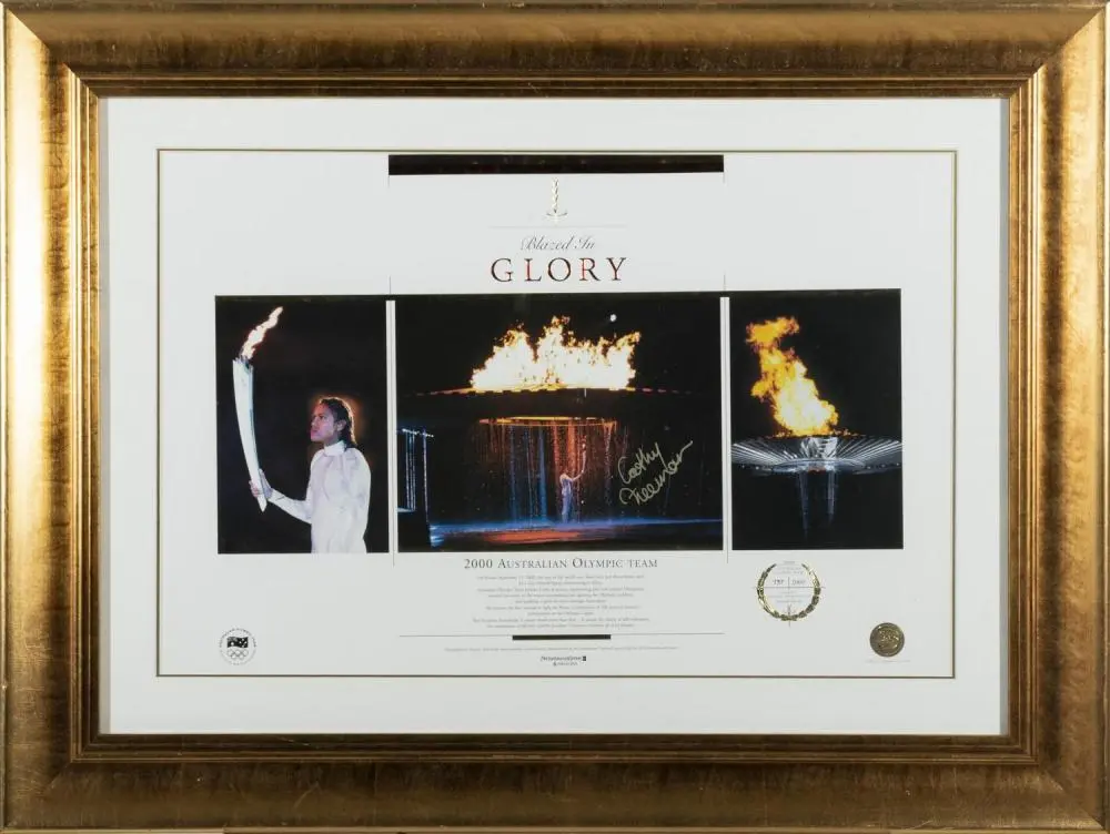 A FRAMED DISPLAY TITLED 'BLAZED IN GLORY'