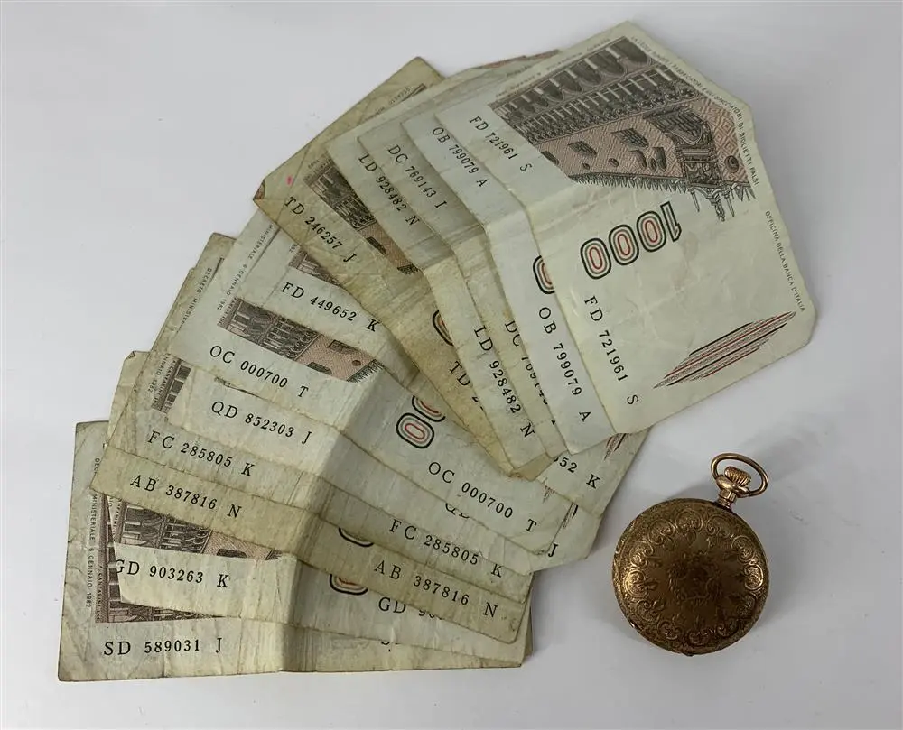 VINTAGE POCKET WATCH AND TWELVE DE-MONETIZED ITALIAN BILLS