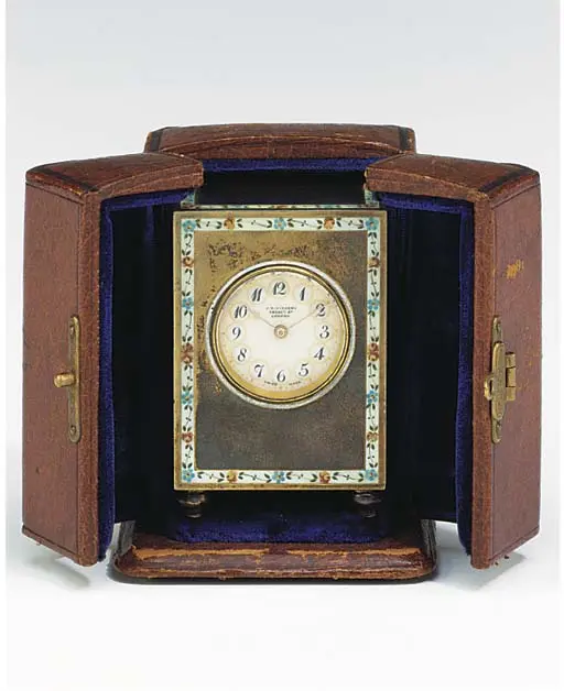 A Swiss silver and enamel miniature travel timepiece, early 20th century