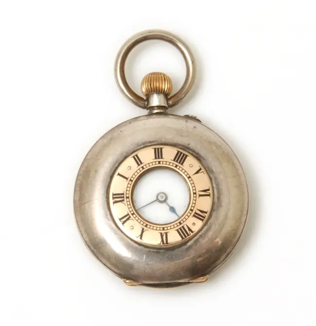 A continental keyless wind half hunter fob watch