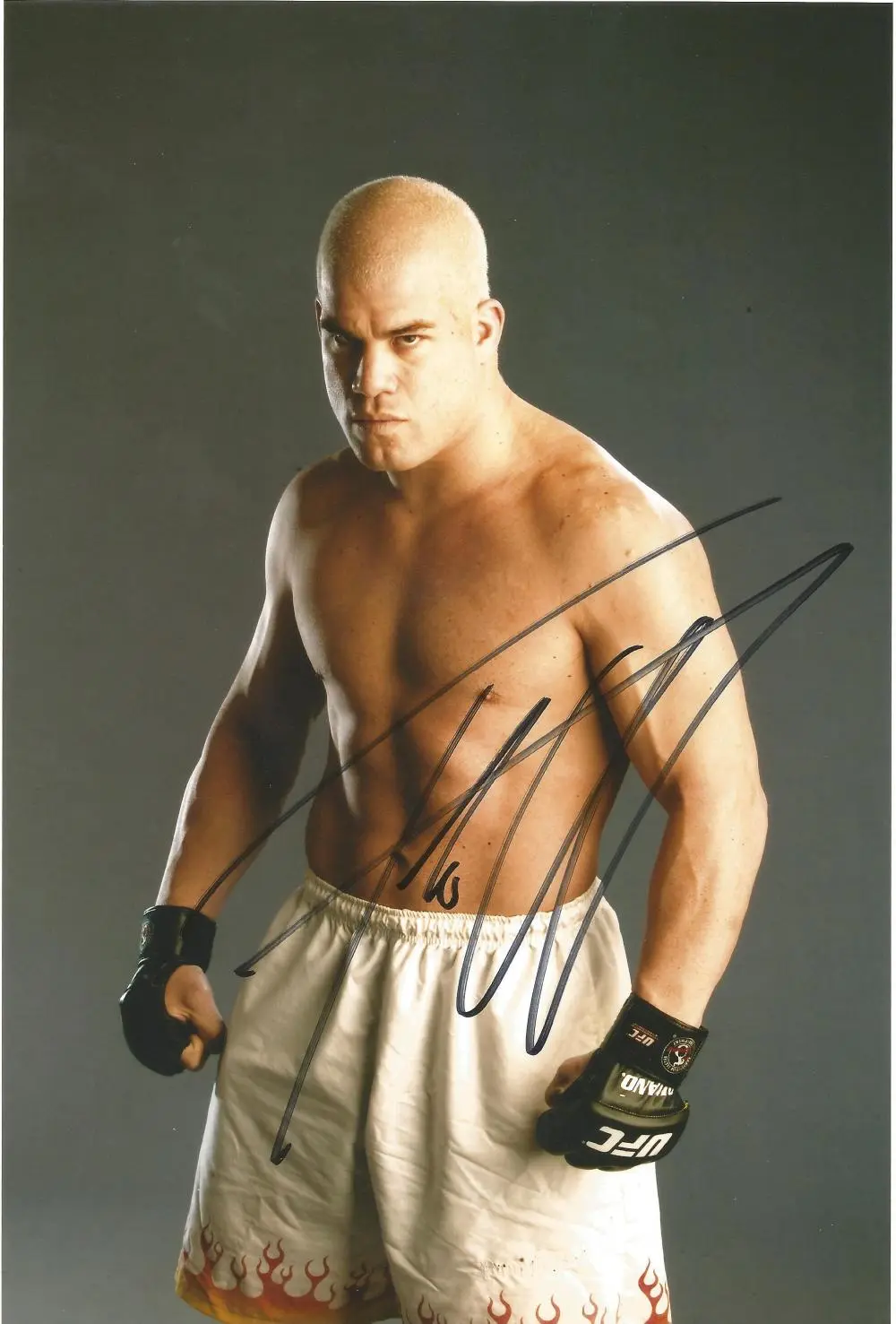 Low Price Sale! UFC / MMA Fighter Tito Ortiz hand signed 10x8 photo. This beautiful hand-signed