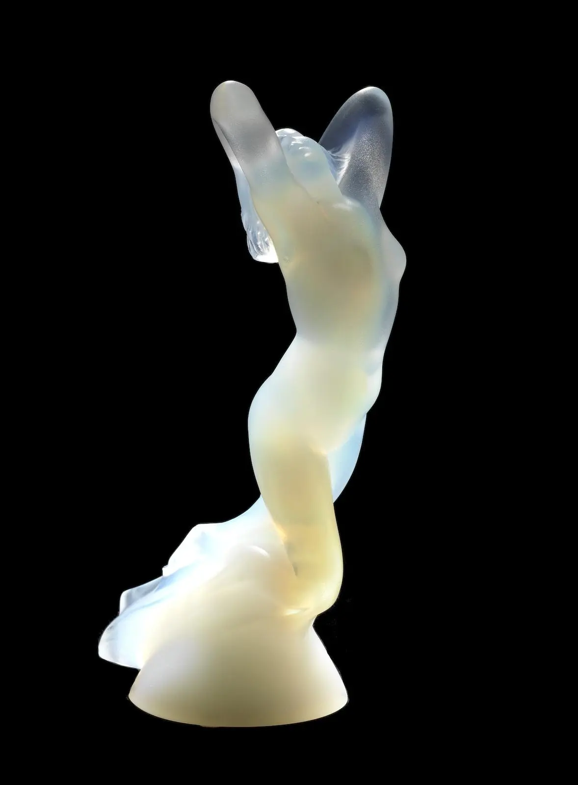 A 'VITESSE' PAPERWEIGHT IN OPALESCENT GLASS BY CRYSTAL LALIQUE OF PARIS,