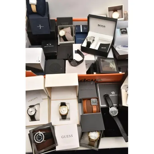 A LARGE BOX OF ASSORTED FASHION WRISTWATCHES, a large assort...